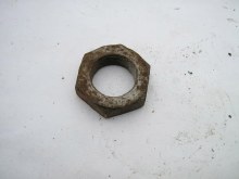 NUT ON END OF CLUSTER GEAR