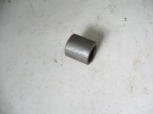 SPACER ON REVERSE ROD