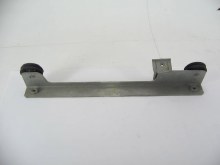 LEFT RAIL AT BOTTOM OF DOOR