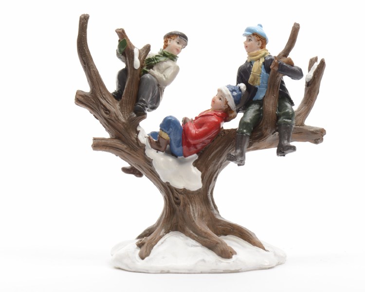 children climbing in a tree