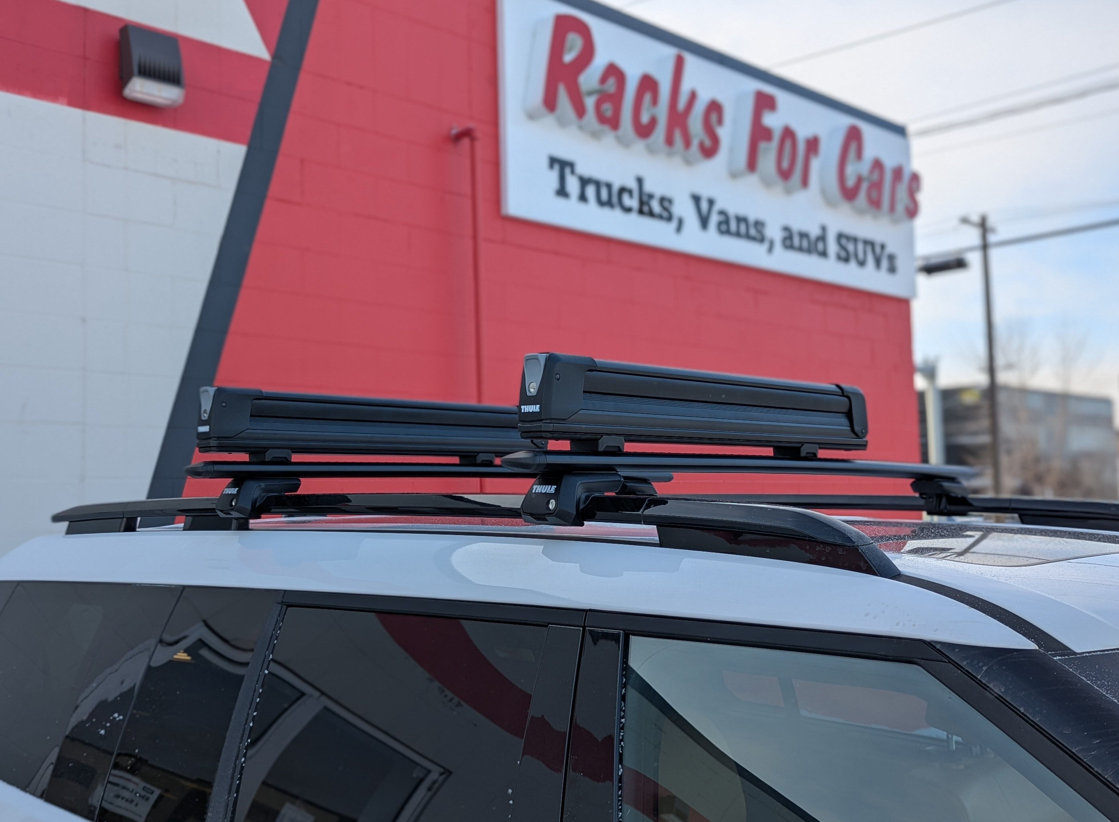 A picture of the Thule SnowPack Extender ski rack in the closed position