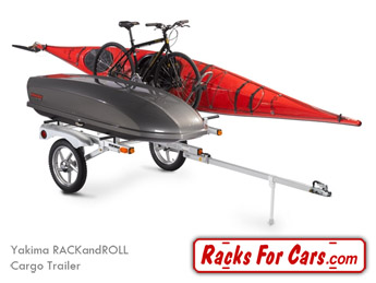 Yakima RACKandROLL Cargo Trailer for carrying bikes, kayaks, canoes, and cargo boxes towed behind a vehicle carrying a SkyBox Pro box, HighRoller bike rack, and HullRaiser kayak rack