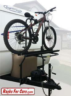Arvika 2 bike rack on travel trailer with bike loaded, left view