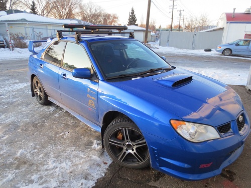 Yakima Q-Towers and Fat Cat 6 Black on a Subaru Imprezza WRX 4 Door Yakima Q-Towers and Fat Cat 6 Black on a Subaru Imprezza WRX 4 Door