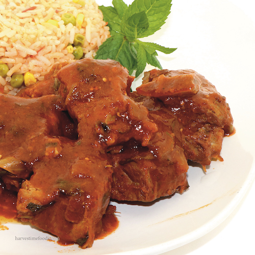 Pork Spare Ribs with zucchini and carrots in a light tomato sauce